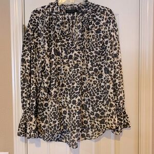 Animal like print color black brown cream tan